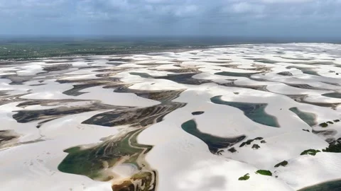 Moving Toward the Cloudy Horizon Across Lençóis Maranhenses Lagoons Stock Footage 342445213