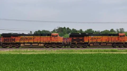 Moving in toward a freight train on the railroad. Stock Footage 243595875