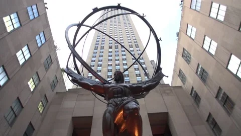 Moving towards and looking up at the Statue of Atlas at Rockefeller Center Stock Footage