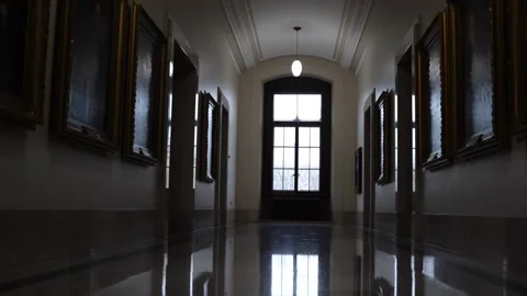Moving towards door in empty old building hallway Stock Footage 169870715