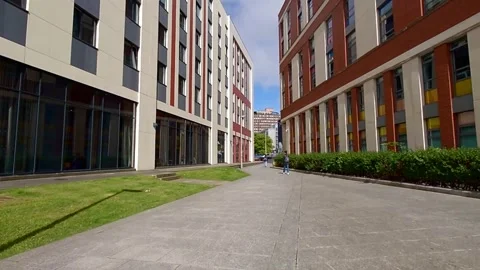 Moving towards a point where two buildings look like they meet Stock Footage 200262116