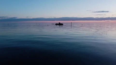 Moving Towards Ship Wreck at Sunset Stock Footage 286296709