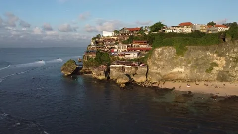 MOVING TOWARDS TOWN ON CLIFF Stock Footage 221300780