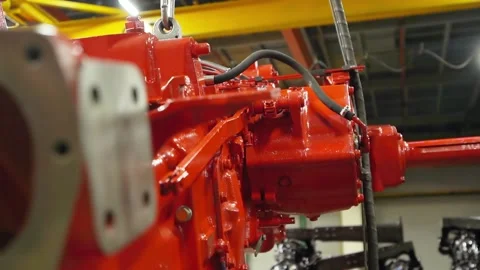 Moving the tractor engine around the shop on the crane beam, the engine is locat Stock Footage 148099787