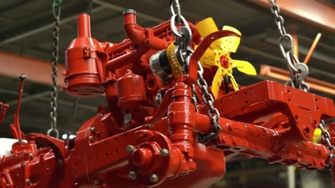 Moving the tractor engine around the shop on the crane beam, the engine is locat Stock Footage 148099798