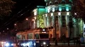 Moving traffic near building of regional council in Vinnytsia city, Ukraine HD Footage
