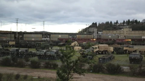 Moving Train &amp; Military Base Vídeos de archivo 87672677