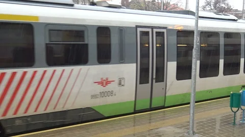 Moving train in rainy day at railway station Stock Footage 101174767
