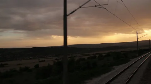 Moving train at sunset point of view Stock Footage 62548409