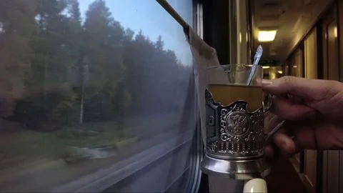 Moving train. Tea in glass in an antique coaster Stock Footage 100920600