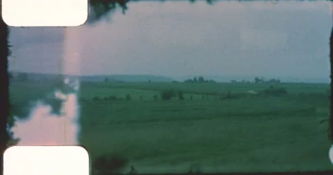 On a moving train through the green countryside Stock Footage 209554310