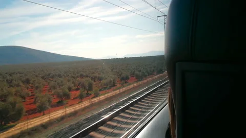 A moving train through a landscape. Stock Footage 169716229