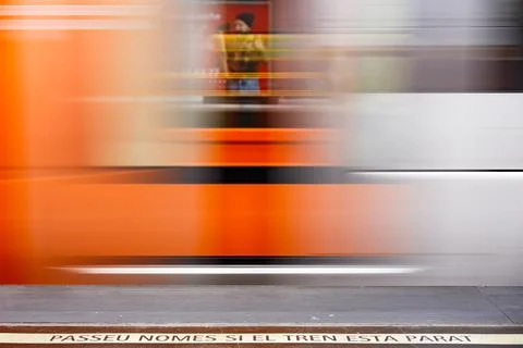 The moving train with a warning sign Stock Photos