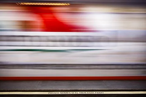 The moving train with a warning sign Stock Photos