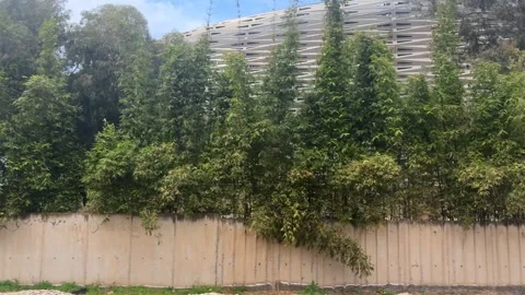 Moving train window view of Prince Moulay Abdellah stadium in Rabat. Stock Footage 331667960