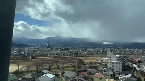 Moving Train Window View of Sendai City Japan Stock Footage 346275834
