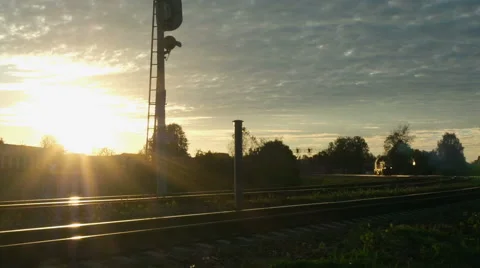 Moving train without carriages at sunset Stock Footage 67829528