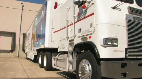 Moving Truck pulling out Stock Footage