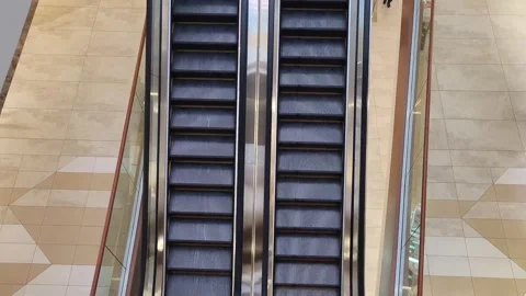 Moving two escalator stairs Stock Footage 329693989