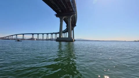 Moving Under Coronado Bridge San Diego CA Water Level View Clear Sky Stock Footage 331614405