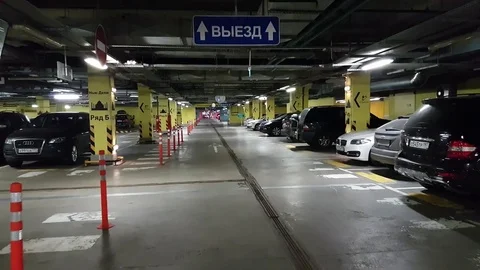 Moving in the underground mall parking Stock Footage
