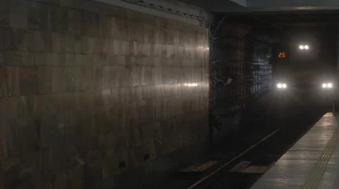 Moving underground train. The arrival of the subway train at the station. Cit Stock Photos