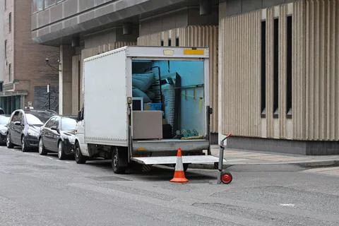 Moving van Moving van with loading ramp at London streets Copyright: xZoon... Stock Photos