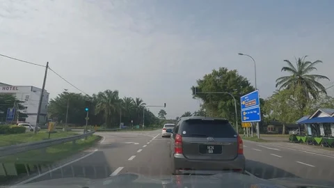 Moving vehicle after the traffic light turns green Stock Footage 314001717