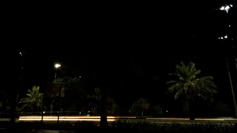 MOVING VEHICLE AT NIGHT - MOTION LAPSE VIDEO Stock Footage 112387669