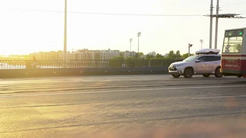 Moving vehicles on the bridge during sunset. Saint Petersburg Stock Footage 155303411