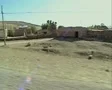 Moving view through rural village SD Footage