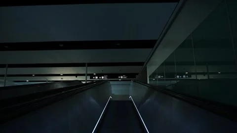 Moving walkway leading to security control at Murcia Airport Stock Footage 328932870