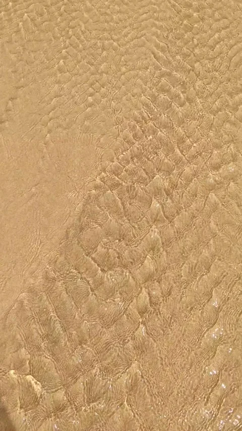Moving Water On The Beach Sand Stock Footage 146714153