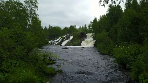 Moving to waterfall treshold of Shuoniyoki at Kola peninsula, Russia Stock Footage 100816667