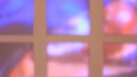 Moving waves of different colors, on a glazed square wall. Out of focuse. Stock Footage 81961341