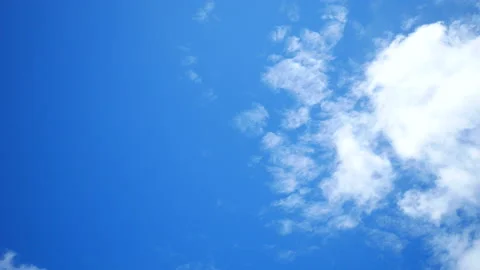 Moving white cloud with beautiful blue sky background at day time Stock Footage 130577716