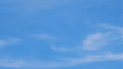 Moving white cloud with  blue sky background at day time Stock Footage 128941869