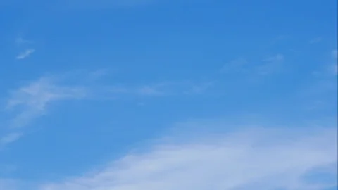 Moving white cloud with  blue sky background at day time Stock Footage 128942409
