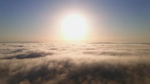 Moving white clouds blue sky scenic aerial view sunrise. Drone flies Stock Footage 132366716