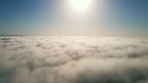 Moving white clouds blue sky scenic aerial view sunrise. Drone flies Stock Footage 132367116