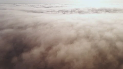 Moving white clouds blue sky scenic aerial view sunrise. Drone flies Stock Footage 132367367