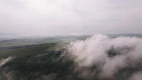 Moving white clouds blue sky on coastline and sea surface scenic aerial Stock Footage 132367376