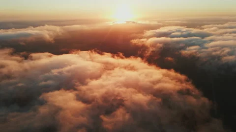 Moving white clouds blue sky scenic aerial view sunset. Sun is hidden at fog Stock Footage 142954746
