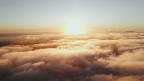 Moving white clouds blue sky scenic aerial view sunset. Sun is hidden at fog Stock Footage 142955078
