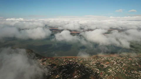 Moving white clouds blue sky on coastline sea surface scenic aerial view summer Stock Footage 160365779