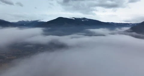 Moving white clouds dramatic sky scenic aerial view. Mountains scene. Stock Footage 174421774