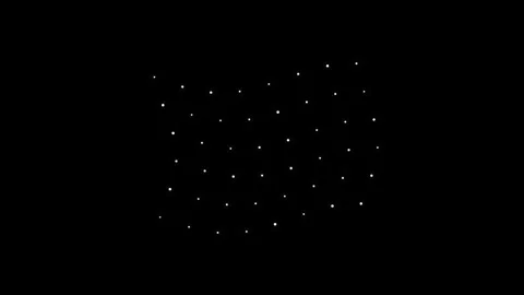 Moving white dots form a wave pattern against a black Stock Footage 339513433