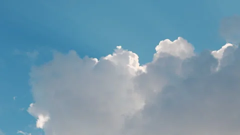 Moving White fluffy clouds with blue sky background 스톡 동영상 306430729
