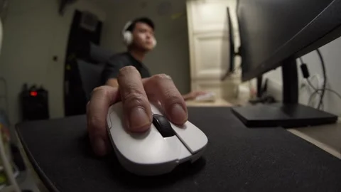 Moving White Gaming Mouse Back and Forth Rapidly on Desk Close Up Stock Footage 333958651