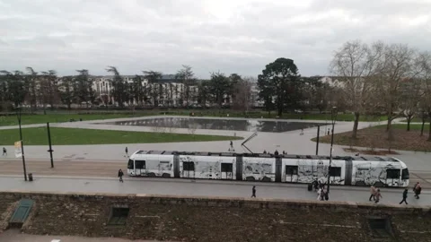 Moving white tram in front of the Château des ducs de Bretagne. Stock Footage 311014562
